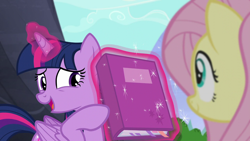 Size: 1280x720 | Tagged: safe, screencap, fluttershy, twilight sparkle, alicorn, pony, g4, the hooffields and mccolts, book, duo, female, magic, mare, twilight sparkle (alicorn)