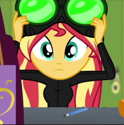 Size: 522x529 | Tagged: safe, screencap, sunset shimmer, equestria girls, equestria girls series, g4, holidays unwrapped, winter break-in, spoiler:eqg series (season 2), breasts, canterlot high, cropped, female, goggles, imagine spot, lockers, night vision goggles, pencil, solo, stealth suit