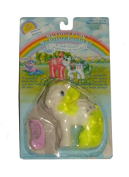 Size: 748x1023 | Tagged: safe, photographer:collector1, baby surprise, buttons (g1), surprise, g1, official, blushing, comb, female, french, irl, packaging, photo, simple background, so soft pony, toy, white background