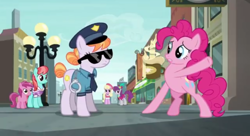 Size: 496x269 | Tagged: safe, screencap, copper top, luckette, pinkie pie, ruby pinch, silver berry, strawberry ice, earth pony, pony, g4, season 6, the gift of the maud pie, background pony, discovery family logo, female, filly, hoof pointing, mare, police, police pony, raised hoof, sunglasses