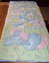 Size: 603x776 | Tagged: safe, photographer:spinky69er, bow tie (g1), g1, bow, cloud, cute, eyes closed, flower, hair bow, merchandise, sleeping, sleeping bag, tail bow, tieabetes