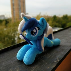 Size: 1944x1944 | Tagged: safe, artist:burgunzik, minuette, pony, unicorn, g4, irl, lying down, mouth hold, photo, plushie, prone, solo, toothbrush