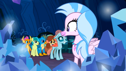 Size: 1365x768 | Tagged: safe, screencap, gallus, ocellus, sandbar, silverstream, smolder, tree of harmony, yona, changeling, dragon, earth pony, griffon, hippogriff, pony, yak, g4, uprooted, chest fluff, dragoness, female, floppy ears, grin, looking at each other, smiling, student six, wide eyes