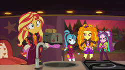 Size: 1334x750 | Tagged: safe, screencap, adagio dazzle, aria blaze, sonata dusk, sunset shimmer, equestria girls, equestria girls series, g4, sunset's backstage pass!, spoiler:eqg series (season 2), bread, caught, female, food, geode of empathy, magical geodes, minidress, oven mitts, shocked, taco dress, the dazzlings, the dazzlings tour bus, toast, toaster, trio, trio female