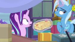 Size: 1280x720 | Tagged: safe, screencap, starlight glimmer, trixie, pony, g4, road to friendship, bedroom eyes, butt, duo, glowing horn, horn, indoors, inflatable raft, lidded eyes, magic, magic aura, plot, raft, trixie's wagon, we're friendship bound, wet, wet mane
