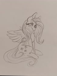 Size: 3468x4624 | Tagged: safe, artist:hkpegasister, fluttershy, pegasus, pony, g4, absurd resolution, blushing, chest fluff, cute, female, mare, monochrome, pencil drawing, shyabetes, sitting, smiling, solo, spread wings, three quarter view, traditional art, wings