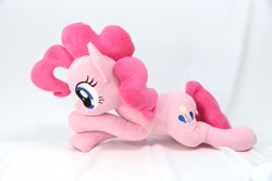 Size: 4096x2731 | Tagged: safe, artist:shunnkai, pinkie pie, earth pony, pony, g4, crossed arms, female, irl, lying down, mare, photo, plushie, side view, smiling, solo