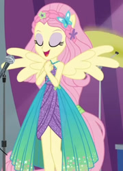 Size: 851x1179 | Tagged: safe, screencap, fluttershy, equestria girls, equestria girls specials, g4, my little pony equestria girls: better together, my little pony equestria girls: rollercoaster of friendship, cropped, female, microphone, ponied up, sleeveless, solo, spread wings, super ponied up, wings