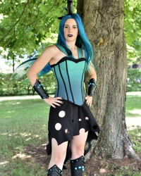 Size: 1080x1350 | Tagged: safe, artist:chiado33, queen chrysalis, human, g4, clothes, cosplay, costume, czequestria, hand on hip, irl, irl human, nail polish, photo, sleeveless, tree