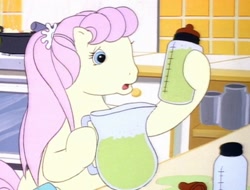 Size: 1419x1080 | Tagged: safe, screencap, misty (g1), earth pony, pony, g1, my little pony tales, too sick to notice, baby bottle, bipedal, blue eyes, chemistry, food, green liquid, holding, kitchen, measuring, oh no, pink hair, pitcher, ponytail, pudding, scrunchie, shocked, solo, yellow pony