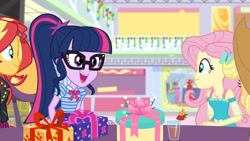 Size: 3410x1920 | Tagged: safe, screencap, applejack, fluttershy, sci-twi, sunset shimmer, twilight sparkle, dashing through the mall, equestria girls, equestria girls series, g4, holidays unwrapped, spoiler:eqg series (season 2), applejack's hat, blurry background, bowtie, clothes, cowboy hat, female, geode of fauna, geode of telekinesis, glasses, hairpin, hat, high res, index get, jacket, jewelry, leather, leather jacket, magical geodes, multicolored hair, necklace, open mouth, open smile, palindrome get, pink hair, ponytail, present, purple eyes, smiling, teal eyes, two toned hair