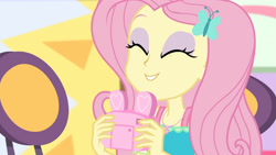 Size: 3410x1920 | Tagged: safe, screencap, fluttershy, dashing through the mall, equestria girls, equestria girls specials, g4, my little pony equestria girls: better together, my little pony equestria girls: holidays unwrapped, camera, cute, eyes closed, female, geode of fauna, hairpin, high res, jewelry, magical geodes, necklace, shyabetes, smiling, solo