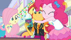 Size: 3410x1920 | Tagged: safe, screencap, fluttershy, pinkie pie, sunset shimmer, dashing through the mall, equestria girls, equestria girls specials, g4, my little pony equestria girls: better together, my little pony equestria girls: holidays unwrapped, clothes, cutie mark, cutie mark on clothes, eyes closed, female, geode of empathy, high res, hug, jacket, jewelry, leather, leather jacket, magical geodes, necklace, open mouth, tank top