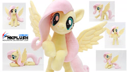Size: 1280x720 | Tagged: safe, artist:nekokevin, fluttershy, pegasus, pony, g4, female, irl, mare, photo, plushie, simple background, solo, spread wings, white background, wings