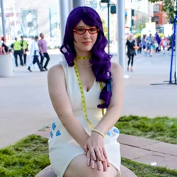 Size: 1080x1080 | Tagged: safe, rarity, human, g4, clothes, cosplay, costume, cutie mark, cutie mark on clothes, denver comic con, glasses, irl, irl human, jewelry, measuring tape, necklace, pearl necklace, photo, sitting