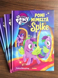 Size: 3024x4032 | Tagged: safe, artist:anthony conley, photographer:anthony conley, spike, twilight sparkle, alicorn, pegasus, pony, g4, my little pony. poni nimeltä spike, book, book cover, colt, cover, female, finnish, happy, implied transformation, indoors, logo, male, mare, mirror, my little pony logo, open mouth, open smile, photo, ponified, ponified spike, reflection, smiling, solo focus, species swap, stallion, twilight sparkle (alicorn)