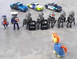 Size: 3662x2801 | Tagged: safe, artist:dingopatagonico, sunburst, pony, g4, high res, irl, judy hopps, photo, police car, police officer, toy, zootopia