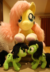 Size: 1024x1465 | Tagged: safe, artist:onlyfactory, artist:ponimalion, fluttershy, oc, oc:filly anon, earth pony, pegasus, pony, g4, bed, bootleg, clothes, female, filly, irl, life size, mare, photo, plushie, size difference, socks, striped socks