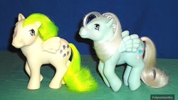 Size: 640x360 | Tagged: safe, surprise, wind whistler, pegasus, pony, g1, adoraprise, cute, female, irl, looking at each other, mare, photo, smiling, smiling at each other, toy, whistlerbetes