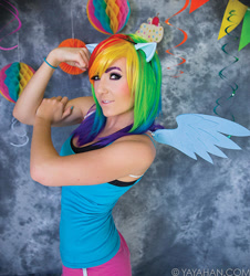 Size: 769x850 | Tagged: safe, artist:jessica nigri, rainbow dash, human, g4, 2015, clothes, cosplay, costume, flexing, irl, irl human, photo, sleeveless, tank top, watermark