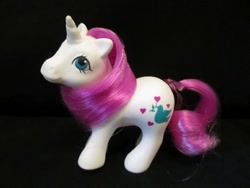 Size: 600x450 | Tagged: safe, artist:customsbypandabear, pony, unicorn, g1, baby, baby pony, baby truly, baby truly (unicorn), baby trulybetes, bow, customized toy, cute, female, filly, irl, photo, prototype, race swap, smiling, tail, tail bow, toy