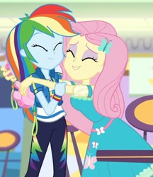 Size: 1453x1680 | Tagged: safe, screencap, fluttershy, rainbow dash, dashing through the mall, equestria girls, equestria girls series, g4, holidays unwrapped, spoiler:eqg series (season 2), clothes, cropped, cute, daaaaaaaaaaaw, dashabetes, eyes closed, eyeshadow, female, geode of fauna, geode of super speed, hairpin, happy, heartwarming, hug, magical geodes, makeup, pants, pink camera, precious, shipping fuel, shyabetes, smiling, sweet dreams fuel