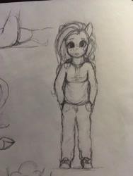 Size: 1536x2048 | Tagged: safe, artist:miokomata, fluttershy, pegasus, anthro, g4, clothes, female, freckles, freckleshy, frown, grayscale, hand in pocket, hoodie, looking at you, mare, monochrome, pencil drawing, traditional art