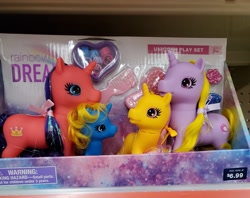 Size: 2985x2367 | Tagged: safe, pony, unicorn, adult, baby, baby pony, bootleg, bow, brush, curly hair, cutie mark, female, filly, foal, hair bow, high res, irl, photo, rainbow dreams, store, tinsel, toy, two moms, united states, walgreens