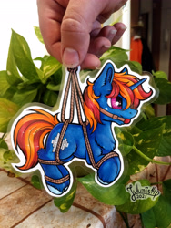 Size: 3456x4608 | Tagged: safe, artist:julunis14, oc, oc only, oc:whirling flow, pony, unicorn, ballgag, bondage, chest fluff, commission, ear fluff, gag, keychain for the fearless, male, paper pony, photo, rope, rope bondage, solo, stallion, suspended, suspension bondage, tied up, traditional art