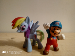 Size: 4000x3000 | Tagged: safe, artist:enrique zx, derpibooru exclusive, rainbow dash, human, pegasus, pony, g4, cutie mark, cutie mark background, figure, ice flower, male, mario, mc donald's toys, new super mario bros., new super mario bros. wii, photo, power-up, simple background, spanish description, super mario bros., text, toy, watermark, xiaomi, xiaomi redmi note 6 pro