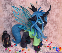 Size: 2689x2304 | Tagged: safe, artist:1stastrastudio, queen chrysalis, changeling, g4, clothes, female, high res, irl, lantern, photo, plushie, shirt, solo