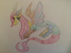 Size: 2828x2121 | Tagged: safe, artist:gibina4ever, fluttershy, draconequus, g4, draconequified, female, flutterequus, high res, mismatched horns, mismatched wings, photo, solo, species swap, traditional art, wings