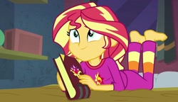 Size: 1251x720 | Tagged: safe, screencap, sunset shimmer, equestria girls, equestria girls specials, g4, my little pony equestria girls: better together, my little pony equestria girls: forgotten friendship, barefoot, book, clothes, cute, feet, female, lying down, prone, shimmerbetes