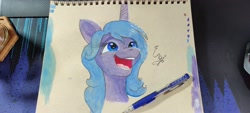 Size: 4000x1800 | Tagged: safe, artist:engi, izzy moonbow, pony, unicorn, g5, my little pony: a new generation, cute, female, happy, mare, open mouth, pencil, photo, simple background, smiling, solo, traditional art, watercolor painting