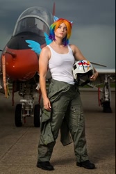 Size: 903x1350 | Tagged: safe, rainbow dash, human, g4, bare shoulders, breasts, clothes, cosplay, costume, female, helmet, irl, irl human, jet, multicolored hair, photo, rainbow hair, sleeveless, solo, standing, tank top