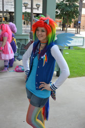 Size: 636x960 | Tagged: safe, artist:glitzygeekgirl, pinkie pie, rainbow dash, human, g4, 2012, animecon, backpack, choker, clothes, cosplay, costume, hand on hip, irl, irl human, merchandise, multicolored hair, photo, rainbow hair