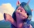 Size: 1038x847 | Tagged: safe, screencap, izzy moonbow, pony, unicorn, g5, my little pony: a new generation, spoiler:my little pony: a new generation, eyebrows, female, grin, hoof heart, horn, looking back, mare, pointing, smiling, solo, underhoof, unshorn fetlocks, upside-down hoof heart