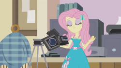 Size: 3410x1920 | Tagged: safe, screencap, fluttershy, equestria girls, equestria girls series, g4, outtakes (episode), clothes, cutie mark on clothes, eyes closed, female, geode of fauna, hairpin, high res, jewelry, magical geodes, necklace, smiling, solo, video camera