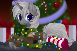 Size: 3000x2000 | Tagged: safe, artist:xvostik, oc, oc only, oc:octal overflow, pony, unicorn, blue eyes, christmas, christmas lights, christmas ornament, christmas presents, christmas tree, clothes, commission, commissioner:biohazard, decoration, ear fluff, eye clipping through hair, high res, holiday, horn, jacket, looking at you, lying down, male, prone, smiling, smiling at you, socks, solo, stallion, striped socks, tree, unicorn oc, ych result