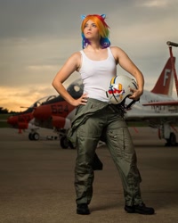 Size: 1080x1350 | Tagged: safe, rainbow dash, human, g4, bare shoulders, clothes, cosplay, costume, hand on hip, helmet, irl, irl human, jet, multicolored hair, photo, rainbow hair, solo, tank top