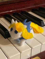 Size: 3024x4032 | Tagged: safe, oc, oc:guiding light, pony, unicorn, doll, irl, keyboard, musical instrument, photo, piano, plushie, solo, stuffed, toy