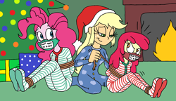 Size: 1648x949 | Tagged: safe, artist:bugssonicx, apple bloom, applejack, pinkie pie, human, equestria girls, g4, angry, apple sisters, arm behind back, bondage, bound and gagged, bow, christmas, christmas eve, christmas lights, christmas pajamas, christmas presents, christmas sleepwear, christmas tree, cloth gag, clothes, cousins, emanata, female, fireplace, footed sleeper, footie pajamas, gag, gift wrapped, happy bondage, happy holidays, hat, hearth's warming eve, help us, holiday, holiday party, living room, onesie, over the nose gag, pajamas, present, related, ribbon, rope, rope bondage, santa hat, siblings, sister, sisters, sticker, tape, tape gag, tied up, tree