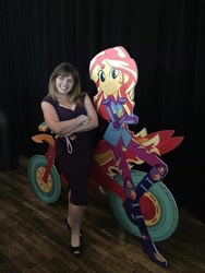Size: 1200x1598 | Tagged: source needed, safe, sunset shimmer, human, equestria girls, g4, my little pony equestria girls: friendship games, cardboard cutout, high heels, irl, irl human, motorcycle, photo, rebecca shoichet, rebecca shoichet with cardboard cutout, shoes, voice actor