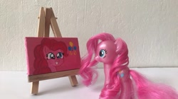 Size: 750x421 | Tagged: safe, artist:lillycloudart, pinkie pie, earth pony, pony, g4, canvas, female, grin, irl, mare, photo, smiling, toy, traditional art