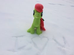 Size: 3264x2448 | Tagged: safe, artist:topsangtheman, peachy sweet, earth pony, pony, g4, apple family member, hearts and hooves day, high res, irl, looking at you, park, photo, plushie, sitting, snow, solo