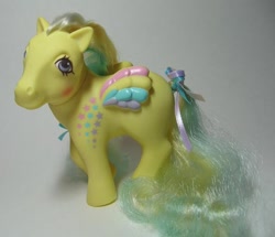 Size: 779x669 | Tagged: safe, photographer:pinkrosedust, ringlet, g1, bow, irl, photo, rainbow curl pony, tail bow, toy