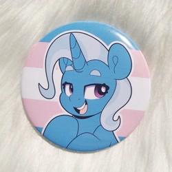 Size: 3120x3120 | Tagged: safe, artist:partypievt, trixie, pony, unicorn, g4, button, craft, etsy, female, high res, photo, pin, pride, pride flag, simple background, solo, trans female, trans trixie, transgender, transgender pride flag