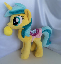 Size: 1280x1354 | Tagged: safe, artist:greenteaplushies, lemony gem, pony, unicorn, g4, background pony, clothes, female, food, irl, lemon, mare, photo, plushie, saddle, skirt, solo, tack