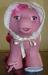 Size: 383x600 | Tagged: safe, photographer:breyer600, sweet dreams (g1), earth pony, pony, g1, bonnet, brush, irl, pacifier, photo, toy