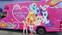 Size: 1328x747 | Tagged: safe, applejack, fluttershy, pinkie pie, rainbow dash, rarity, twilight sparkle, alicorn, human, g4, car, dutch, irl, irl human, mane six, my little pony logo, netherlands, photo, twilight sparkle (alicorn), vriendschap tour